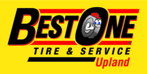 A yellow and red logo for the restore tire & service.